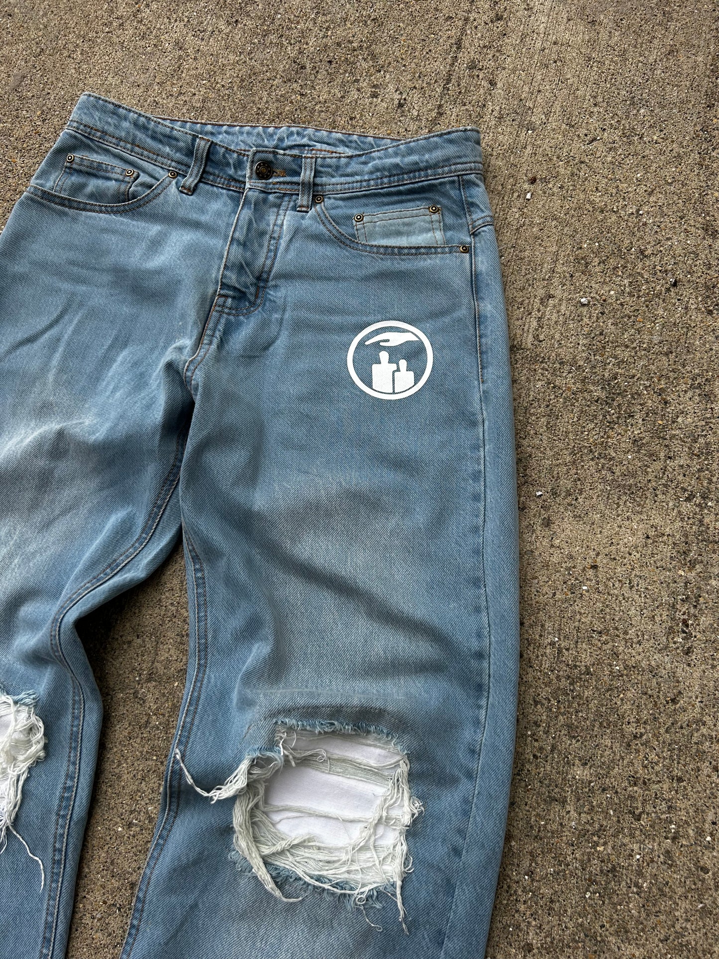 “Damage Control” Jeans