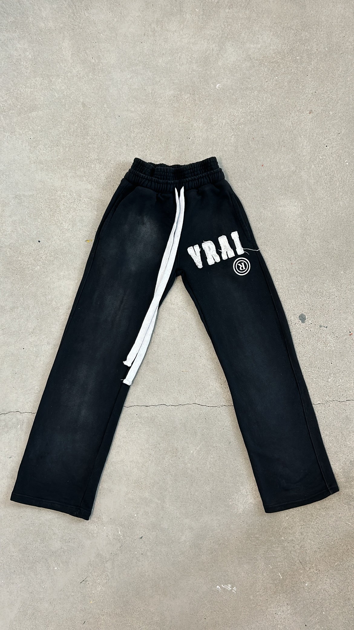 Black "UNRESTRICTED" Pants